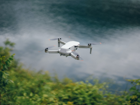 drone flying over a body of water