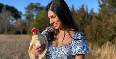 women holding a hen