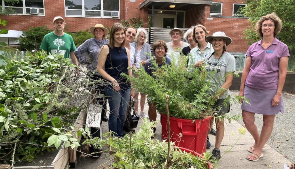 a smiling group of master gardeners