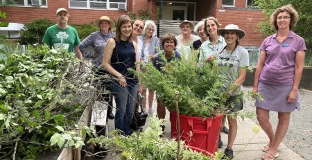 a smiling group of master gardeners
