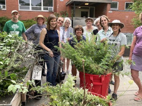 a smiling group of master gardeners