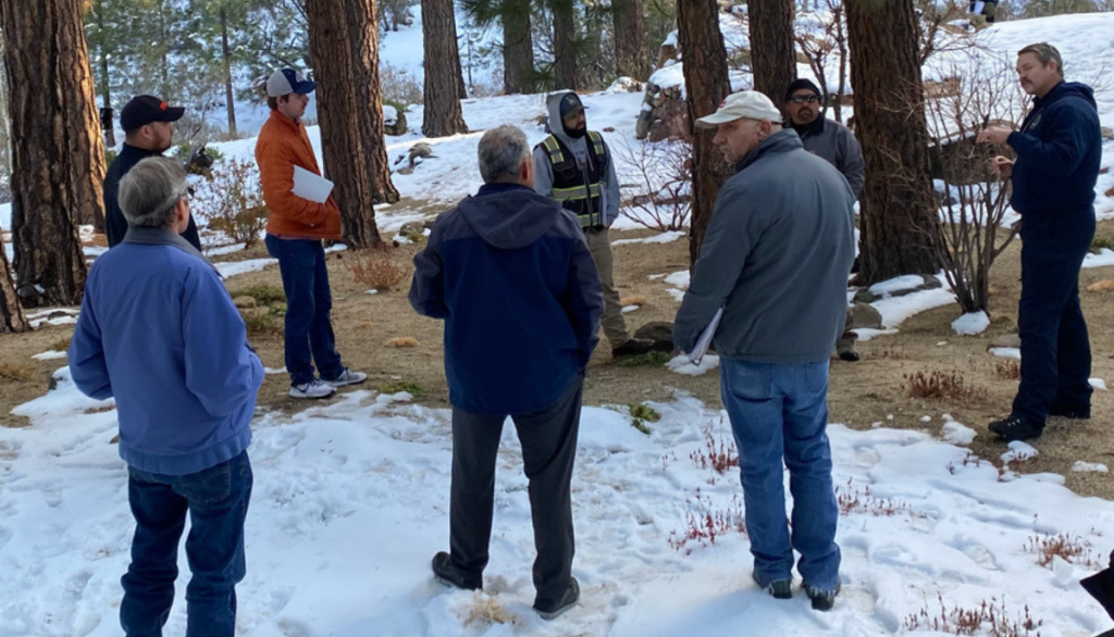 a group of training participants learn about fire safety