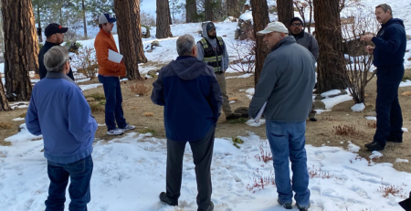 a group of training participants learn about fire safety