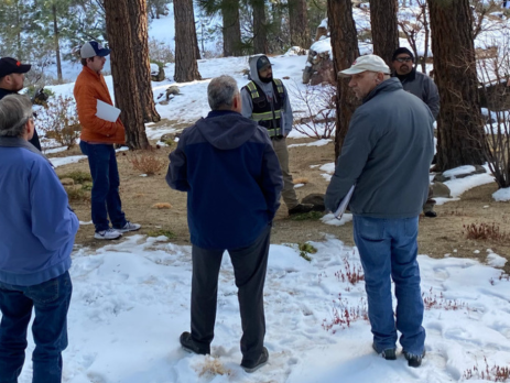 a group of training participants learn about fire safety