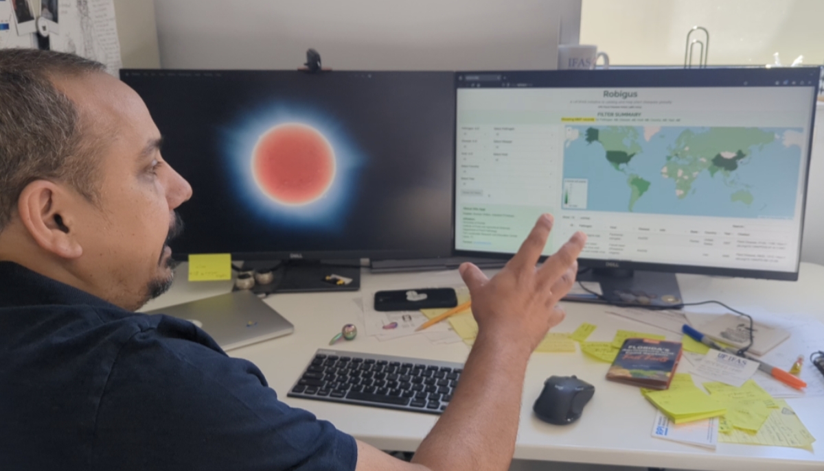 Braham Dhillon, a molecular plant pathologist at UF/IFAS Fort Lauderdale Research and Education Center, demonstrates Robigus from his desktop.