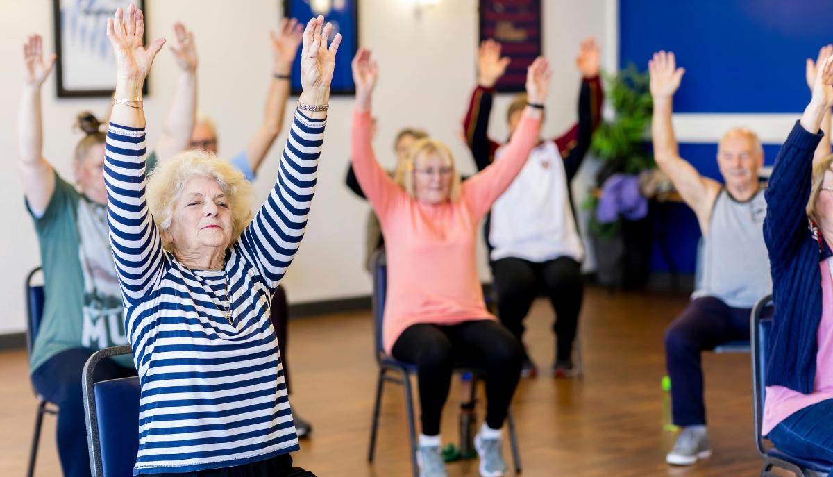 seniors doing chair exercises