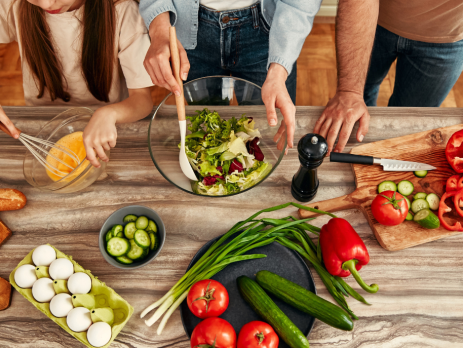 a family preparing a meal