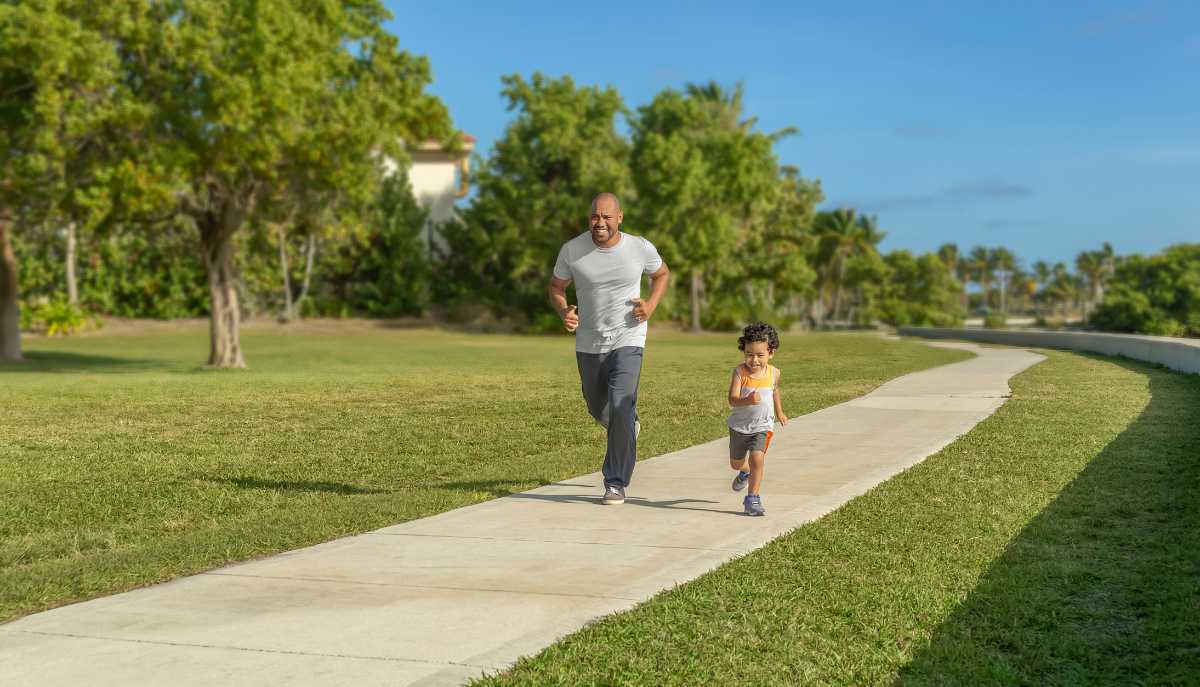 a father and child running