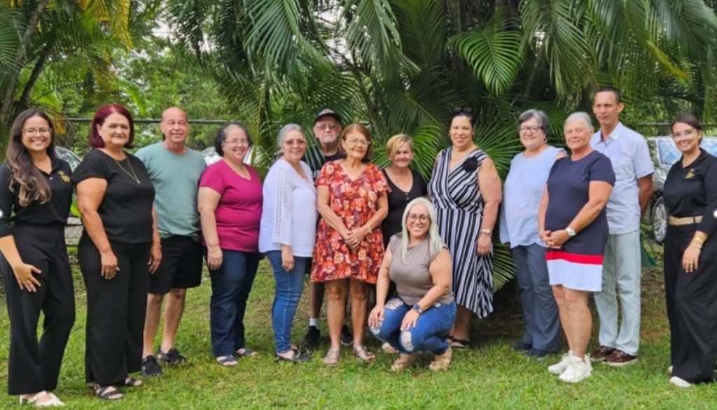 a group of smiling participants