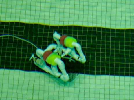 An underwater remotely operated vehicle, or ROV, runs though one of its underwater challenges at the SeaPerch regional competition hosted by Louisiana 4-H.