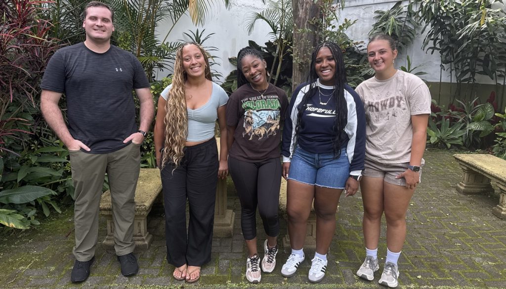 a group of smiling college students