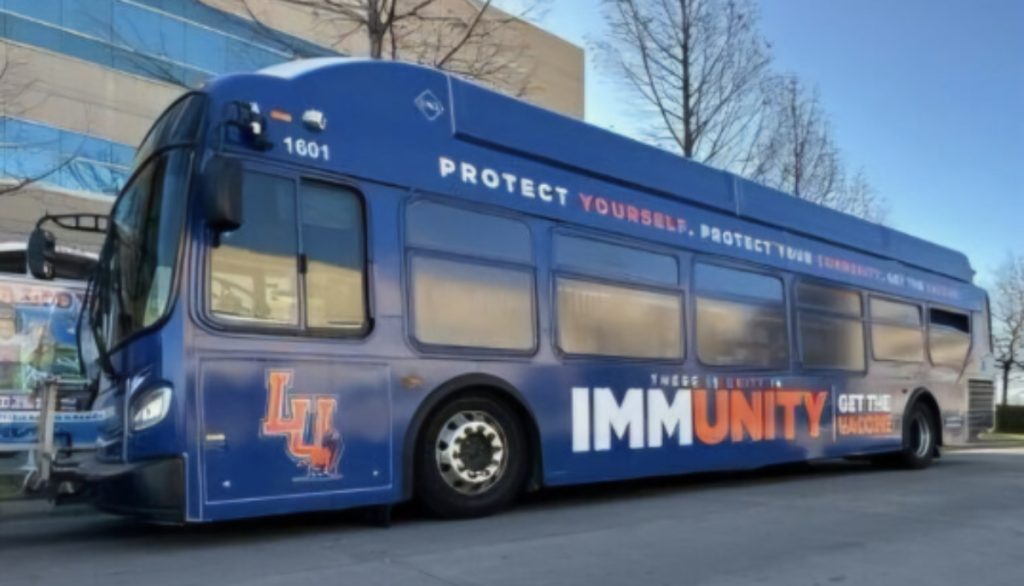 Unity in Immunity Awareness OKC Bus Wrap Campaign sponsored by Langston University Extension