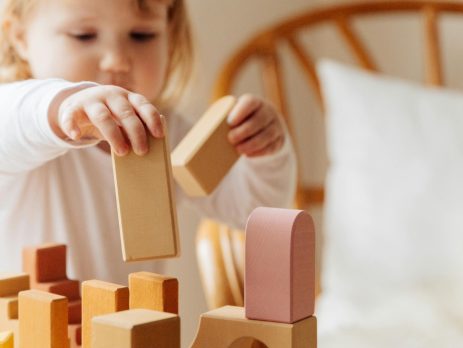 child playing with building blocks