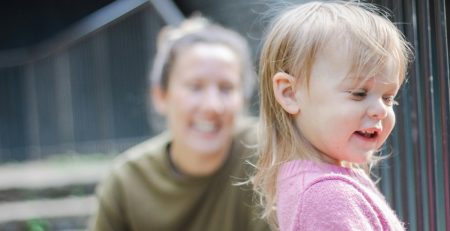 Mother and child smile