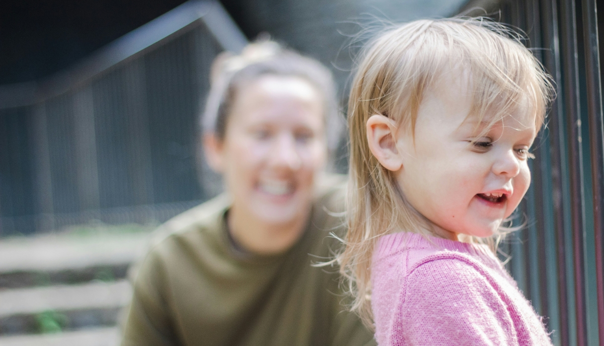 Mother and child smile