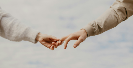 two people holding hands