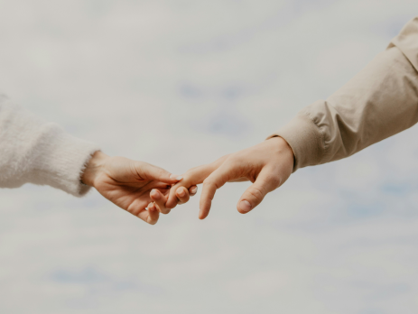 two people holding hands