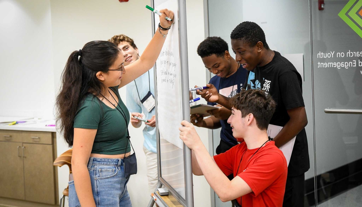 teens engaging in activities at a workshop