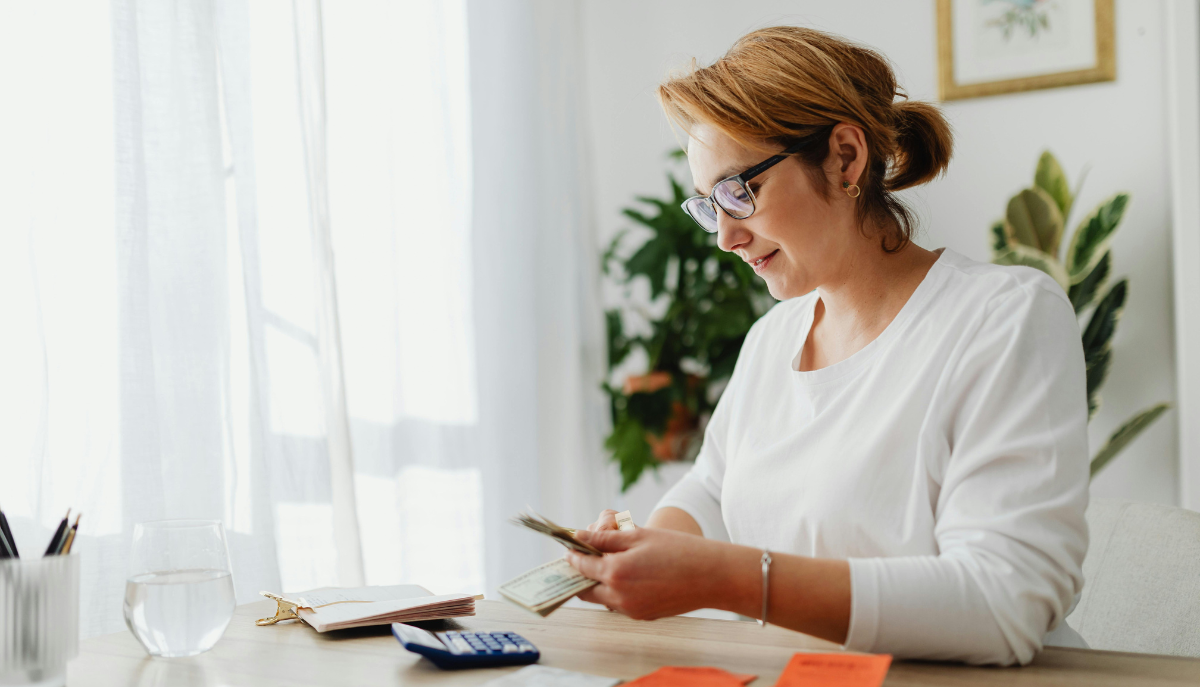 a woman paying bills